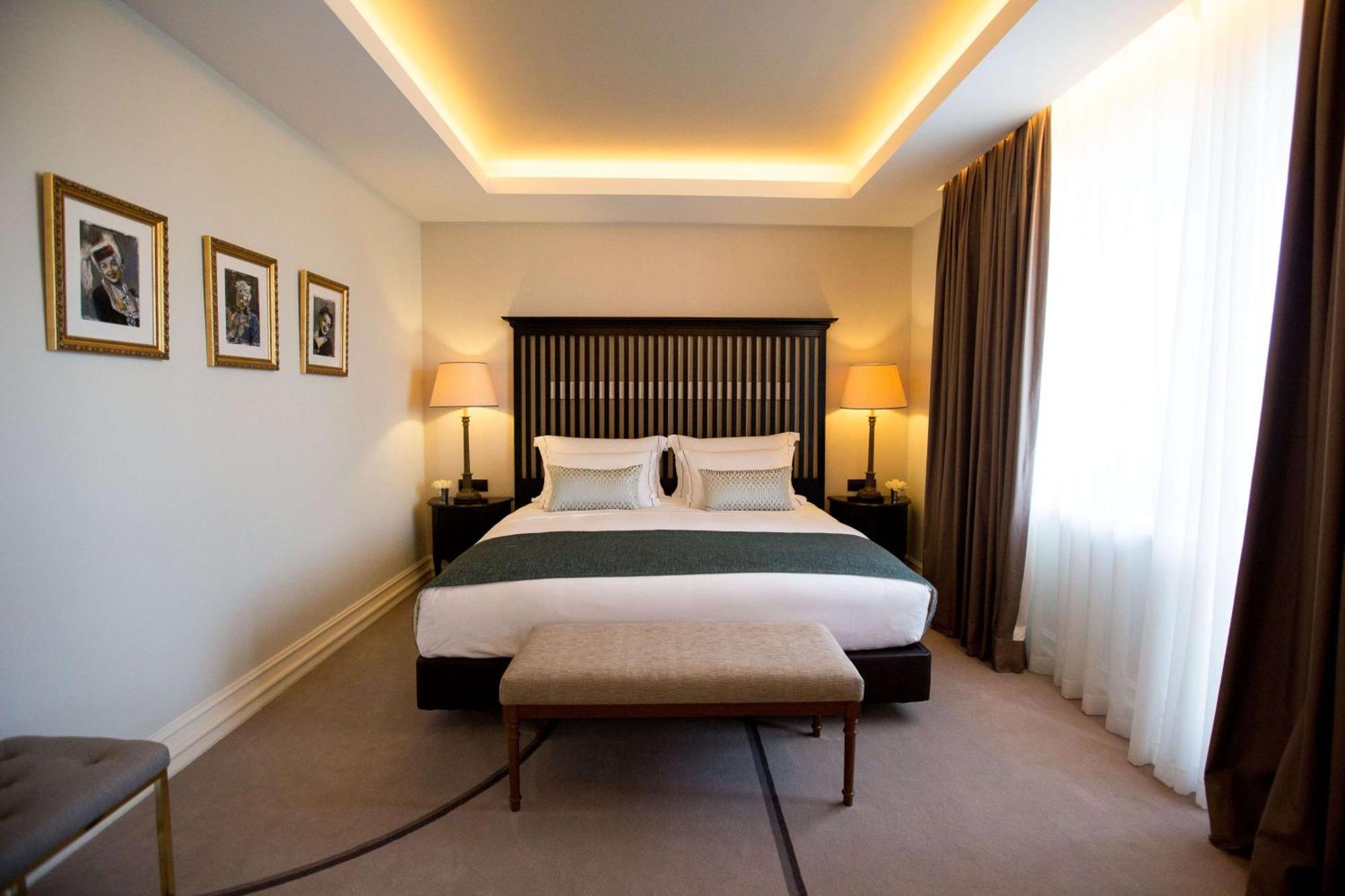 ホテル チボリ アヴェニーダ リベルダーデ リスボン エクステリア 写真 A bedroom at the hotel