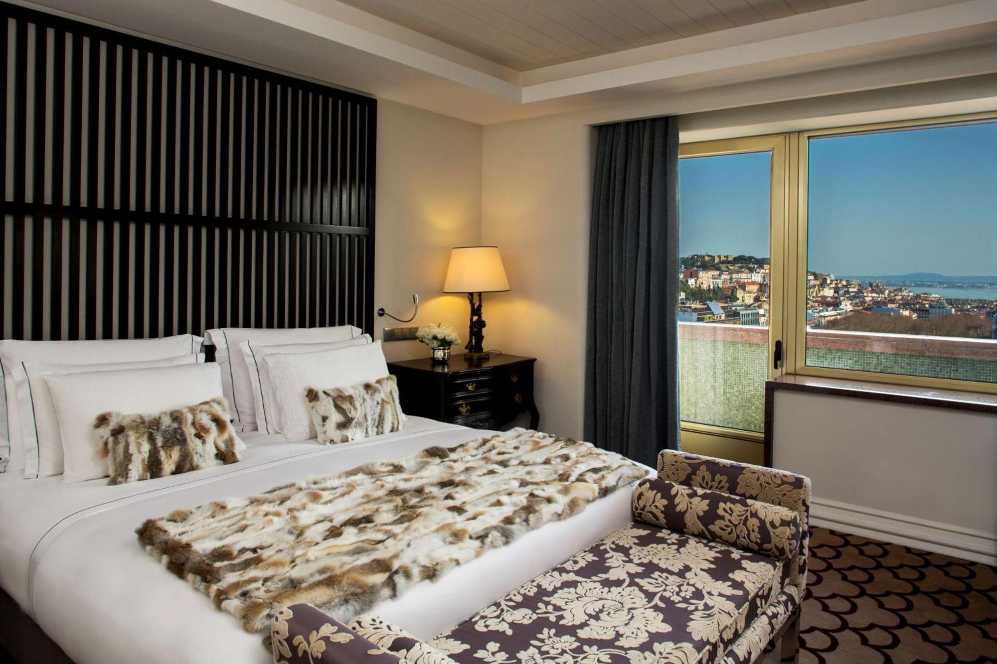 ホテル チボリ アヴェニーダ リベルダーデ リスボン エクステリア 写真 A bedroom at the hotel