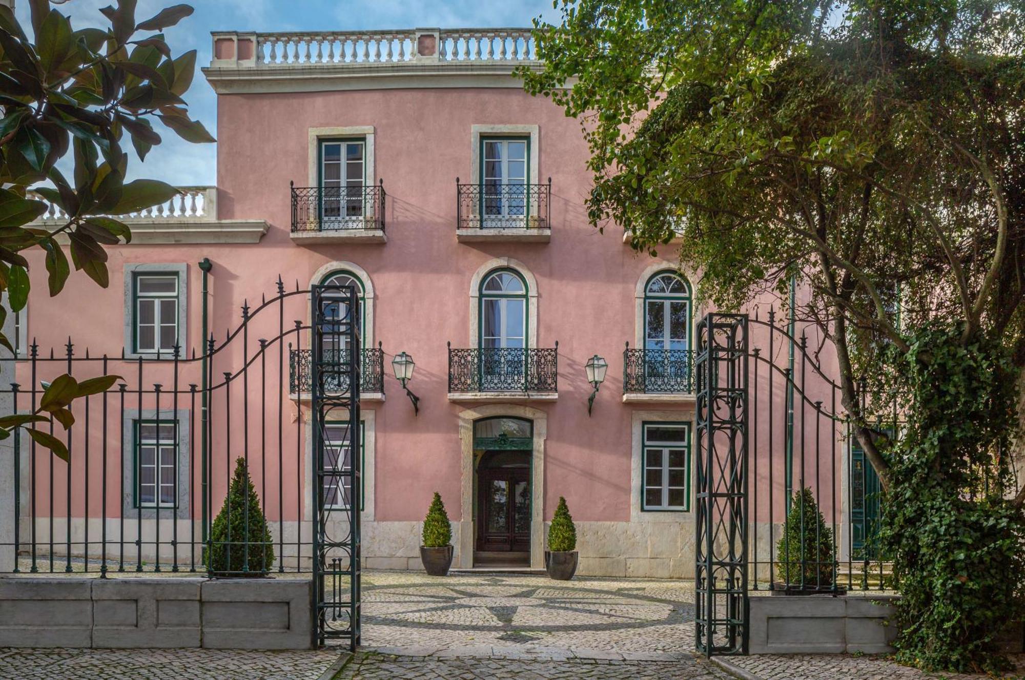 ホテル チボリ アヴェニーダ リベルダーデ リスボン エクステリア 写真 The front facade of the palace